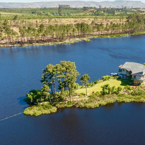 https://capewinefarms.com/static/1677/w_424_im8_2114pano_house_on_peninsula_1__scale_and_crop__500x500.jpg